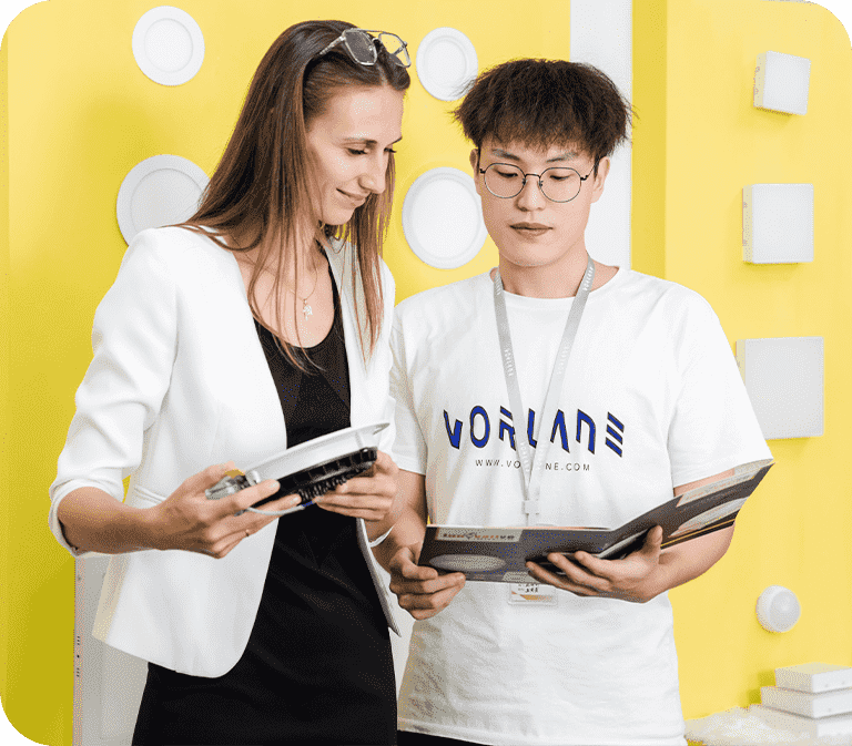 vrlane's sales is discussing panel light details with customer - Leading LED lighting Manufacturer - Vorlane - Vorlane - Leading LED lighting Manufacturer - Vorlane - Vorlane